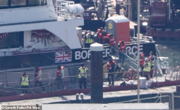 As the PM was speaking about 'proper control and management' of UK borders another load of Channel boat arrivals were being brought ashore in Dover