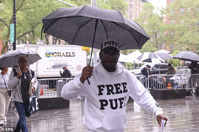 A supporter of Sean 'Diddy' Combs enters a federal courthouse as Combs' trial for sex trafficking, racketeering, and prostitution charges continues in New York, New York, USA, 9 May 2025