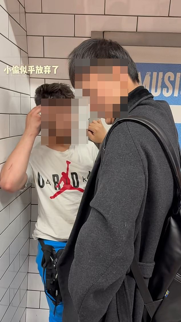 The steadfast student guards the man until police eventually arrive to arrest him from the tube platform