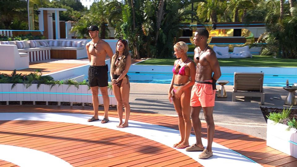 Four Love Island contestants standing in swimwear by a pool.
