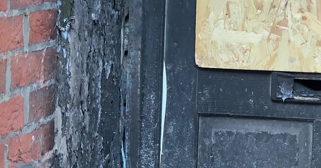 FIRE ONE: The black paint is blistered from the flames in what one neighbour told MailOnline may have been a firebomb attack
