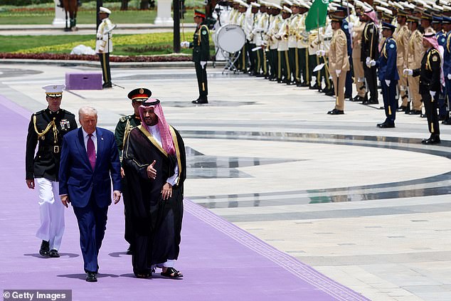President Donald Trump walks with Saudi Crown Prince Mohammed bin Salman during an official state arrival ceremony