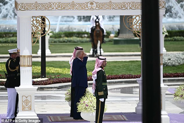 President Donald Trump reviews the honour guard at the Royal Court in Riyadh