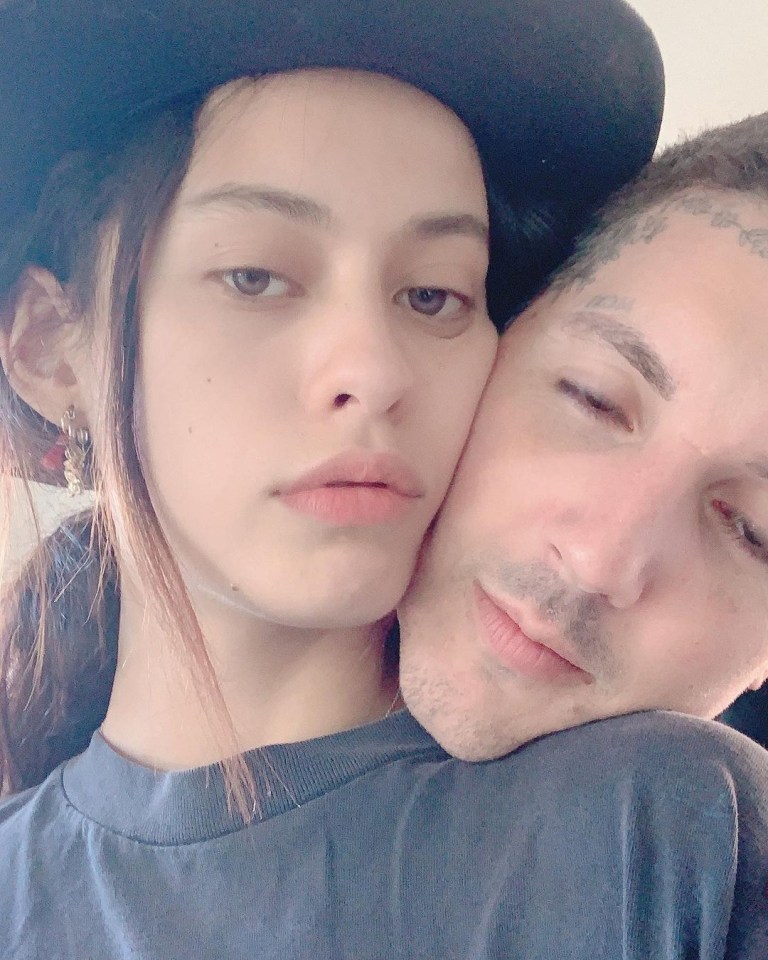 Close-up photo of a couple embracing.