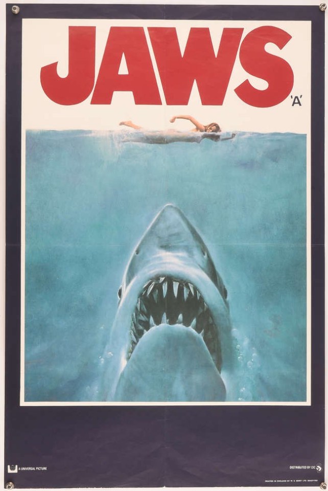 Jaws movie poster showing a shark underwater and a swimmer above.