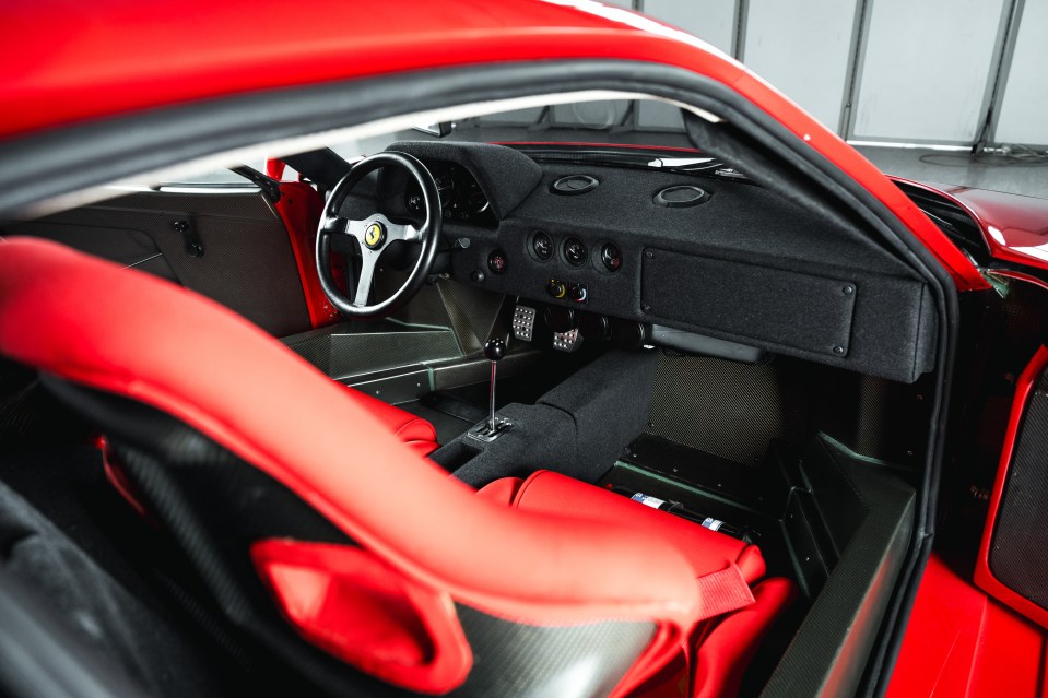Interior view of a red Ferrari F40.
