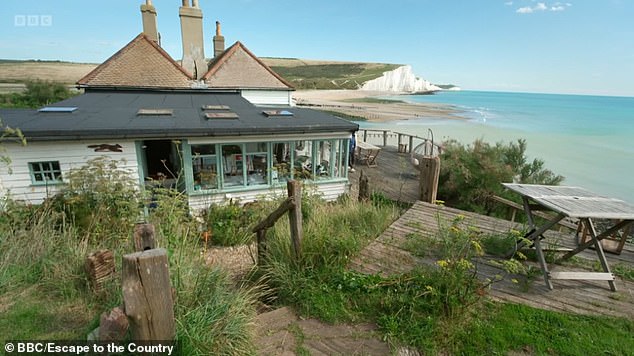 The couple's house boasts a large country kitchen, two guest bedrooms, a bedroom in a cabin and stunning views