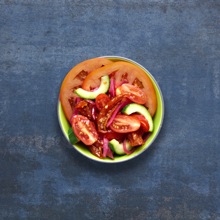 Portuguese tomato salad in a bowl.