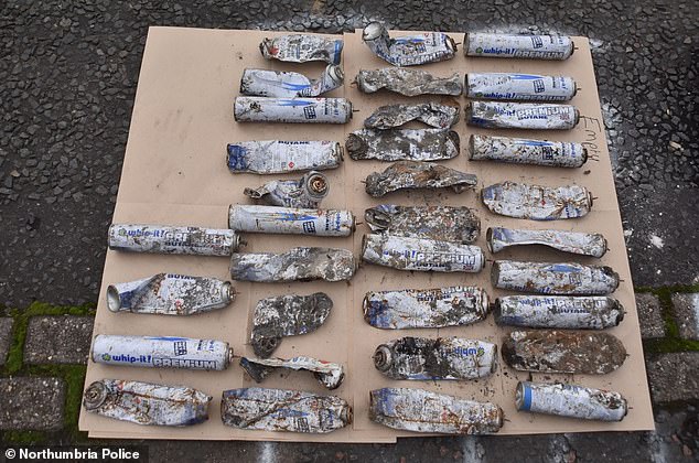 Some of the 100 gas canisters used to make cannabis gummy sweets, which led to the blast