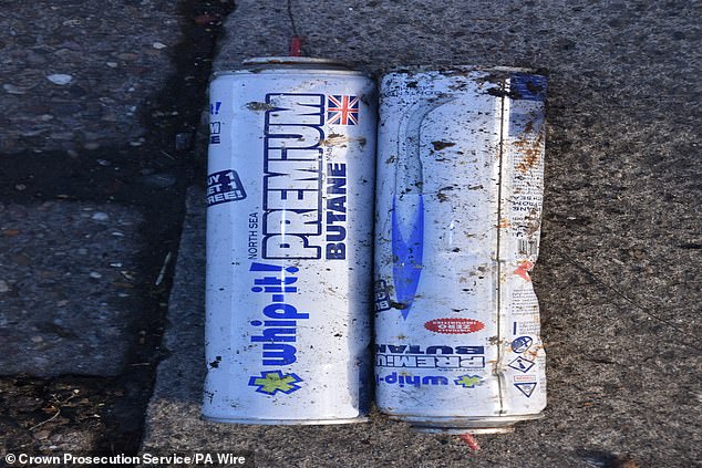 Butane gas canisters recovered from the scene, in a photograph issued by the CPS