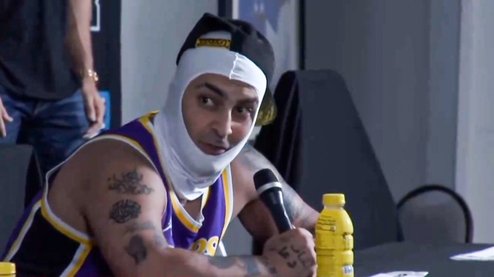 **TAKEN WITHOUT PERMISSION** Shocking moment Alex Stein throws 'hotdogs' at Muslim faith fighter Modeen ahead of Misfits boxing fight. TWITTER CAPTION: Watch me dump some glizzies on Mo Deen and then throw his shoes on the roof of the press conference!