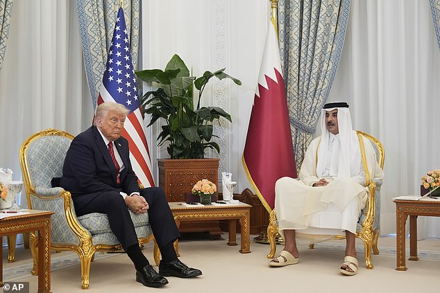 President Donald Trump and Qatar's Emir Sheikh Tamim bin Hamad Al Thani
