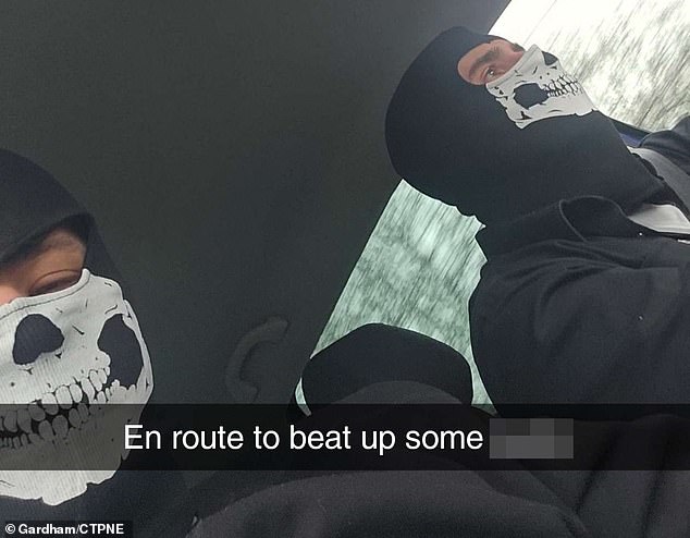 Far right plotter Marco Pitzettu in a skull mask adopted by the far-right accompanied by a masked relative making racist threats in an image released by police. He captioned it: 'En route to beat up some p***s