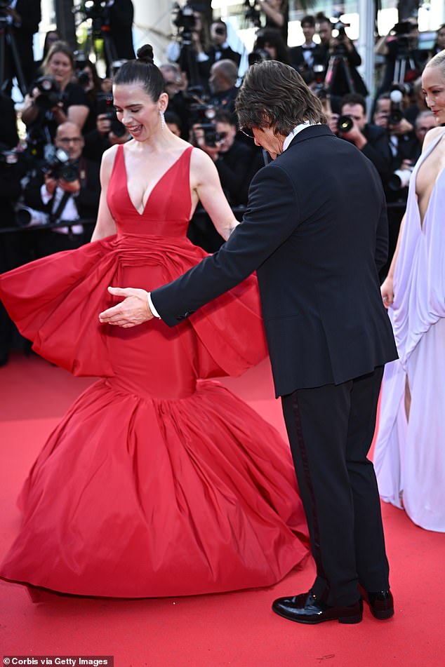 Tom was every inch the doting gentleman as he let Hayley steal the moment