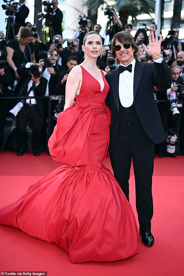 Hayley looked radiant and glowing in a massive ruffled red gown as she joined the main man on the glittering red carpet