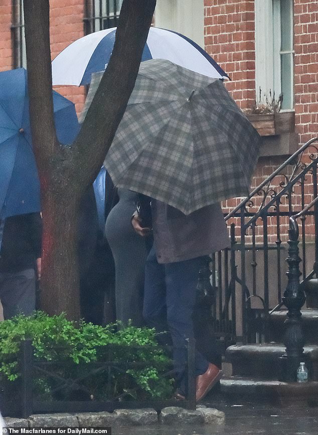 Ventura was shielded by umbrellas as she headed back to court for the second day on the witness stand