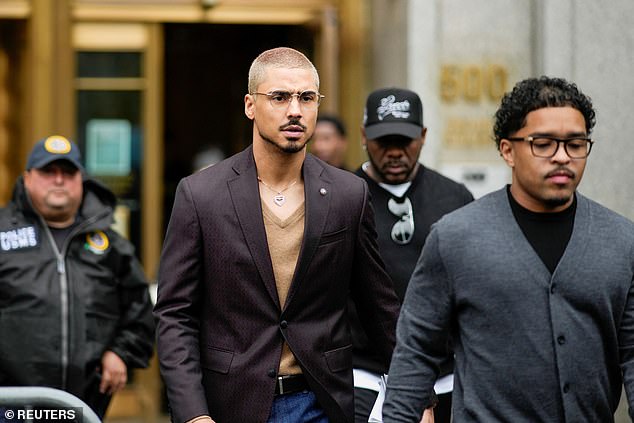 Quincy Brown and Justin Combs, sons of Sean "Diddy" Combs, exit the US court in Manhattan on Wednesday
