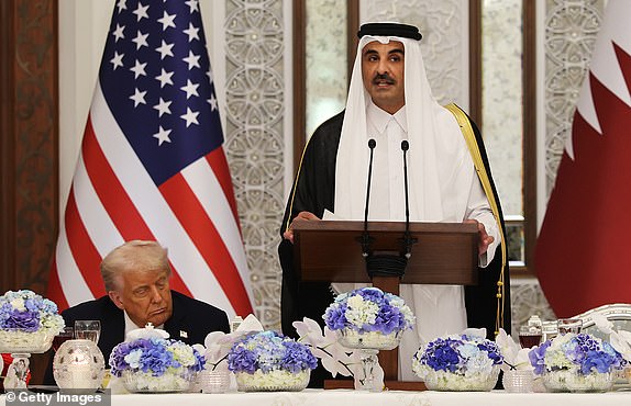 DOHA, QATAR - MAY 14: U.S. President Donald J. Trump and Emir of Qatar Tamim bin Hamad al Thani attend a state dinner at the Lusail Palace on May 14, 2025, in Doha, Qatar. The visit underscores the strategic partnership between the United States and Qatar, focusing on regional security and economic collaboration.  (Photo by Win McNamee/Getty Images)