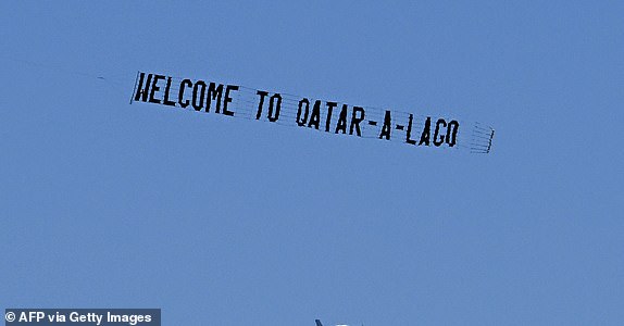 A sky banner with the words "Qatar-a-Lago" flies in the sky near US President Donald Trump's Mar-a-Lago residence in Palm Beach, Florida, on May 14, 2025. (Photo by CHANDAN KHANNA / AFP) (Photo by CHANDAN KHANNA/AFP via Getty Images)