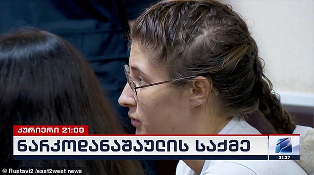 She told the court she chose to remain silent about the charges brought against her