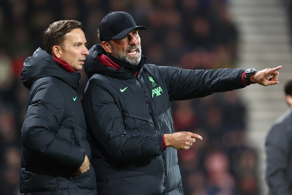 Jurgen Klopp and Pepijn Lijnders, Liverpool managers, at a match.