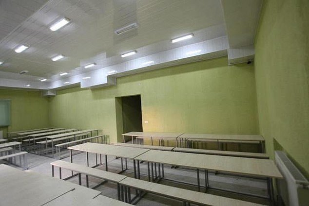 Pictured: Rows of tables of chairs in the prison