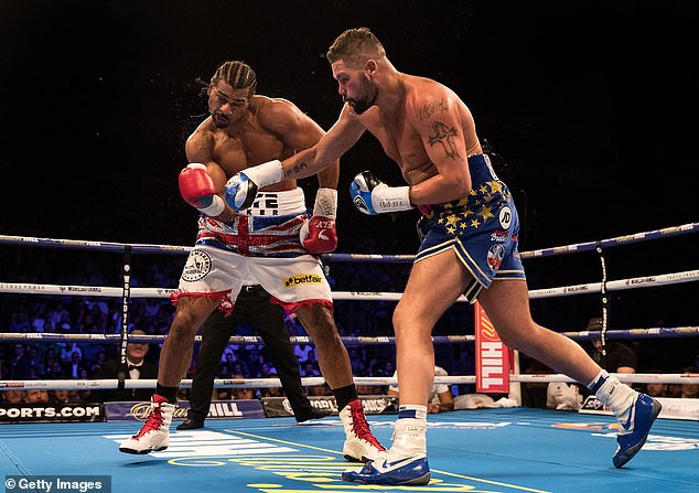 In 2018, David announced his retirement from boxing following back-to-back defeats by rival Tony Bellew (both pictured)