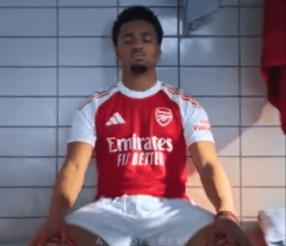 Arsenal player meditating in a locker room.
