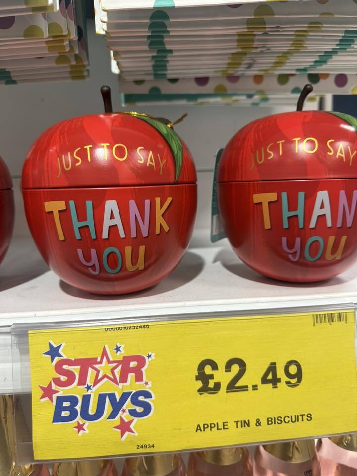 Two apple-shaped tins of biscuits that say "Just to say Thank You," priced at £2.49.