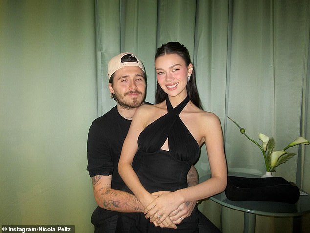 Prince Harry and Meghan Markle are reportedly 'secretly supporting' Brooklyn Beckham and his wife Nicola Peltz (pictured) amid their 'similar family feuds'