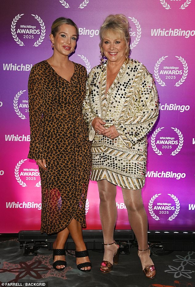 Styling her long blonde tresses in a low bun, Helen beamed for photos alongside Buzz Fizz star Cheryl Baker, 71, before taking to the stage to speak to the crowd