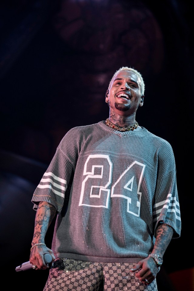 Chris Brown performing on stage.