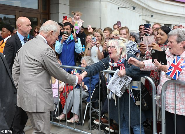 The royals shook hands with members of the public who were patiently awaiting their arrival