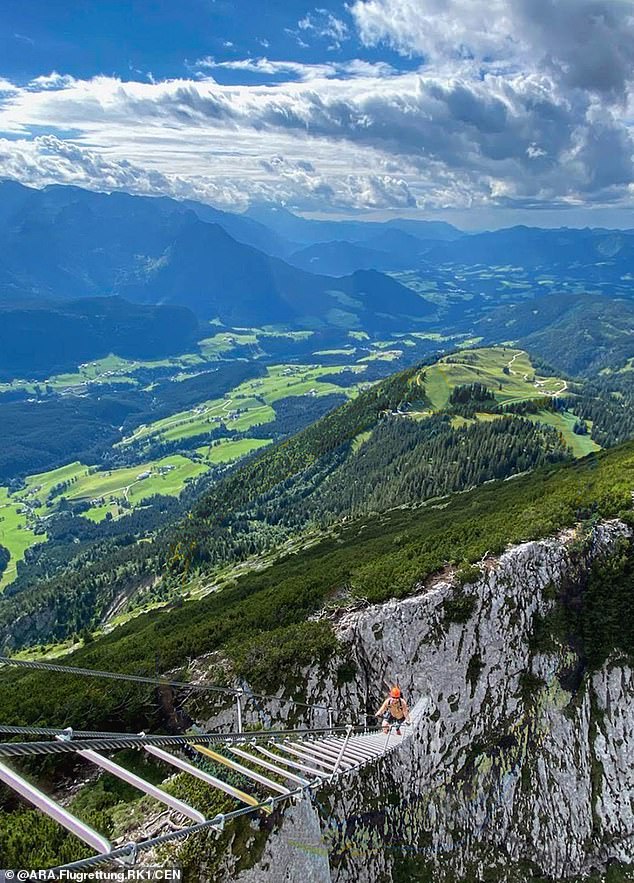 The 21-year-old Brit slipped while attempting to take pictures of his friends on the so-called 'Himmelsleiter' - a notorious attraction on the Donnerkogel Mountain