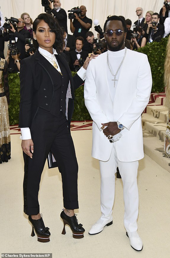 Sean Combs, right, and Cassie Ventura, attend The Metropolitan Museum of Art's Costume Institute benefit gala celebrating the opening of the Heavenly Bodies: Fashion and the Catholic Imagination exhibition, May 7, 2018, in New York. (Photo by Charles Sykes/Invision/AP)