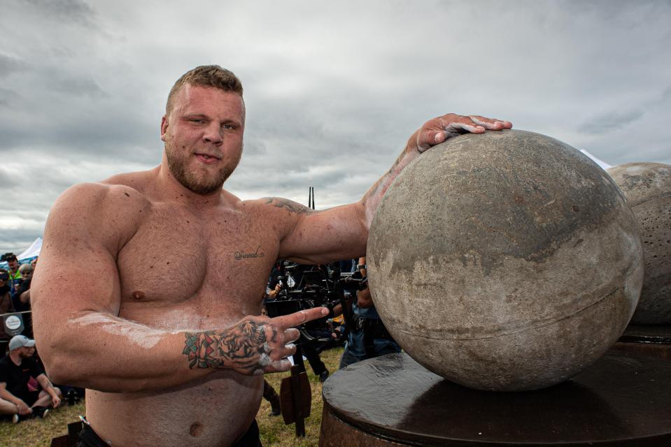 Tom Stoltman, World's Strongest Man, celebrating.