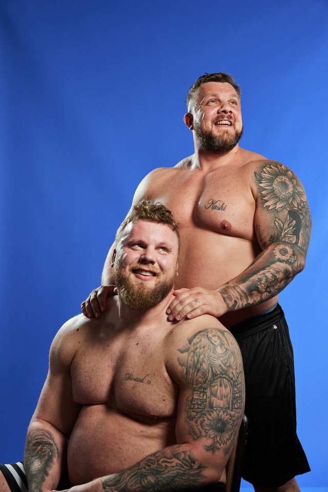 Portrait of the Stoltman brothers, Tom and Luke, strongmen, posing together.