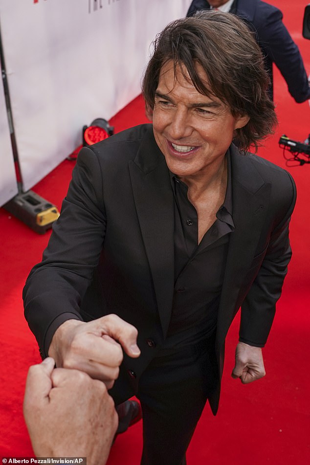 He stopped to fistbump photographers and chat to fans