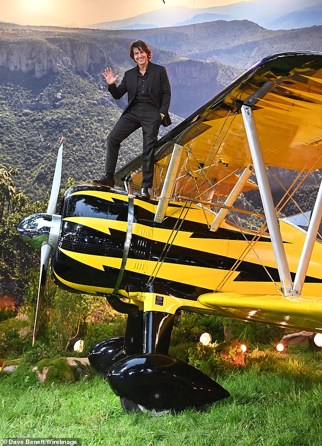 He embodied his character as he posed next to the scene for pictures