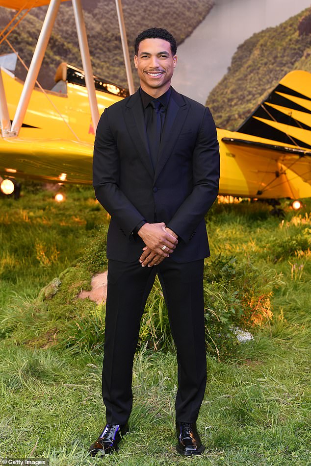Tarzan Davis who plays Degas in the franchise was suited and booted as he arrived on the red carpet