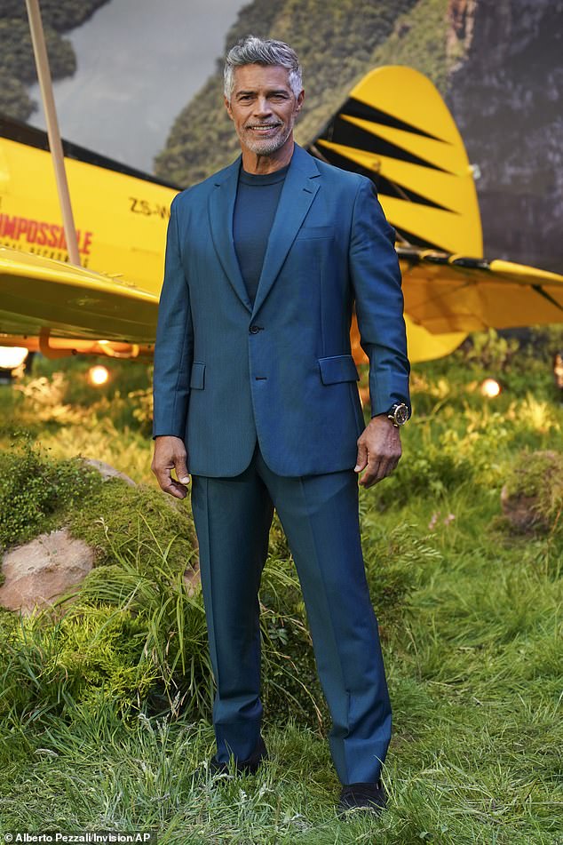 Their co-star Esai Morales opted for an equally colourful look in a stylish blue ensemble
