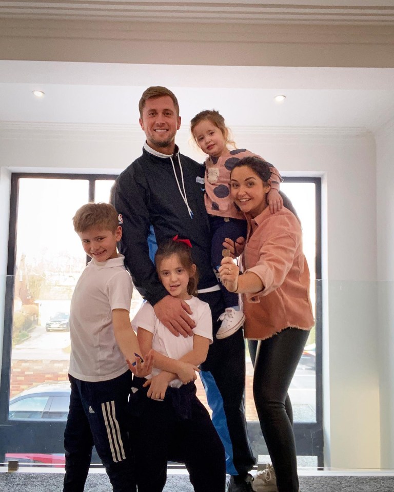 Family portrait of Jac Jossa and Dan Osborne with their three children.