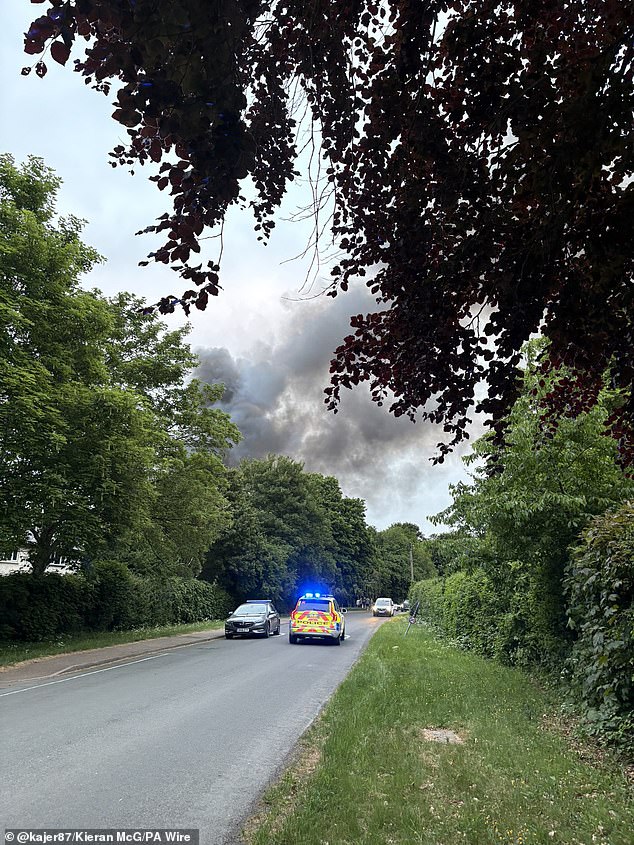 Local councillor Sam Holland said he saw the blaze 'from a distance' adding: ' There's lots of emergency vehicles