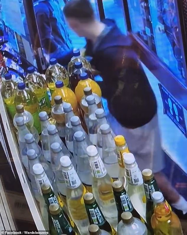 In another damning CCTV clip two youngsters appear to grab food items before quickly running out of the door without paying