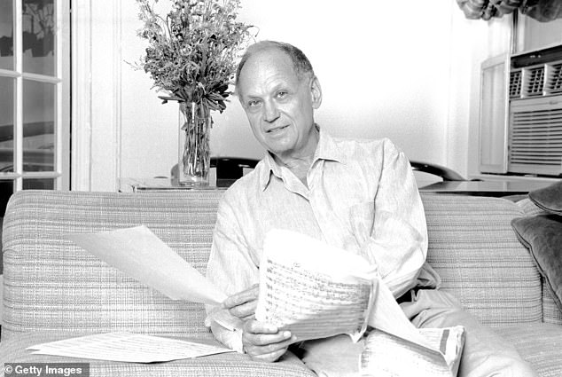Strouse holds sheet music at the Yamaha Showroom in NYC on August 10, 1995