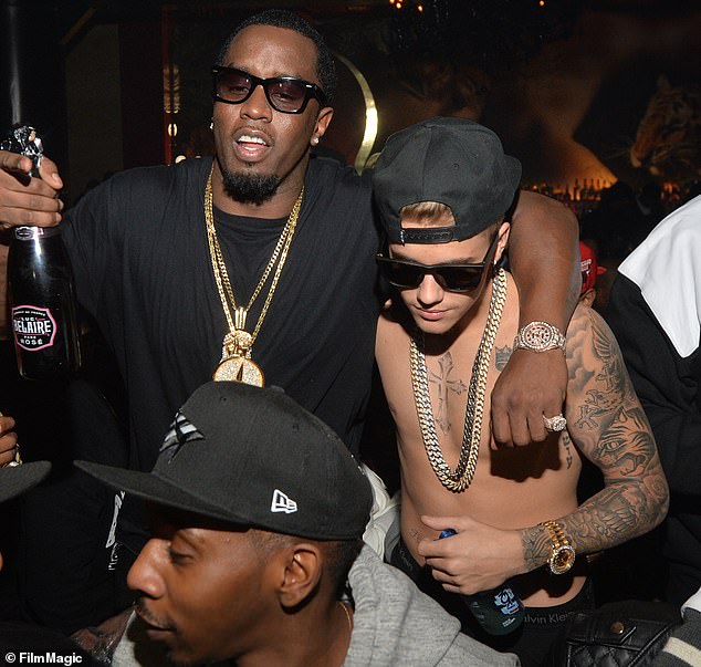 Sources informed TMZ in an article published on Thursday that Diddy never abused Bieber in any way; seen in 2014 in Atlanta