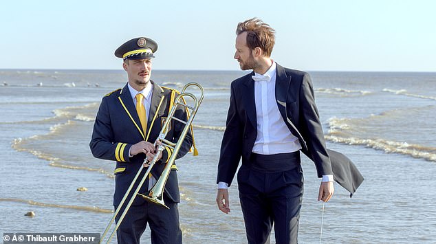 Pictured: Pierre Lottin as Jimmy Lecocq and Benjamin Lavernhe as Besormeaux in The Marching Band