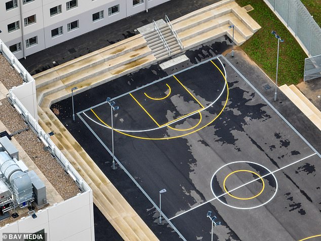 Built from recycled materials and using solar panels to reduce its carbon footprint, the lock-up will have a clear focus on rehabilitating offenders (Pictured: Multi-use games area)