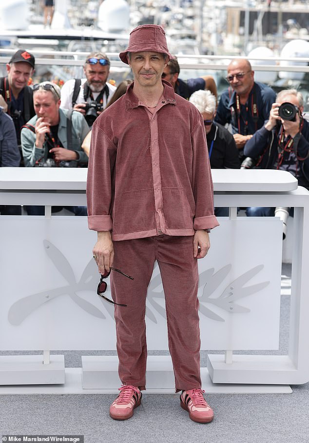 Jeremy Strong delighted crowds at Cannes by appearing in a pink Lanvin ensemble - complete with £900 sneakers and matching (pink corduroy) bucket hat