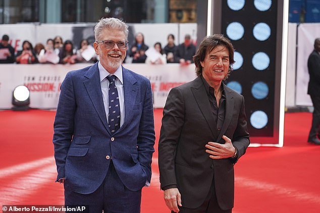 Director Christopher McQuarrie and Tom Cruise arrive at the premiere of Mission: Impossible - The Final Reckoning